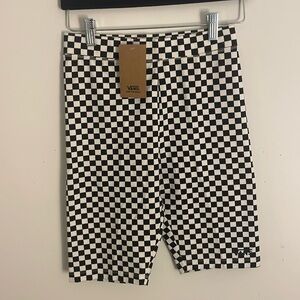 Vans checkered biker shorts.
